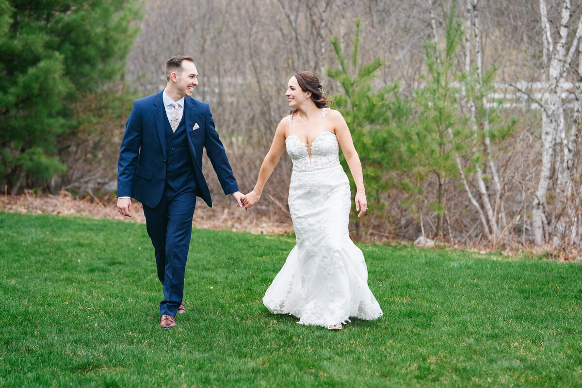 Romantic wedding portraits of bride and groom at The Barn at Bull Meadow in NH