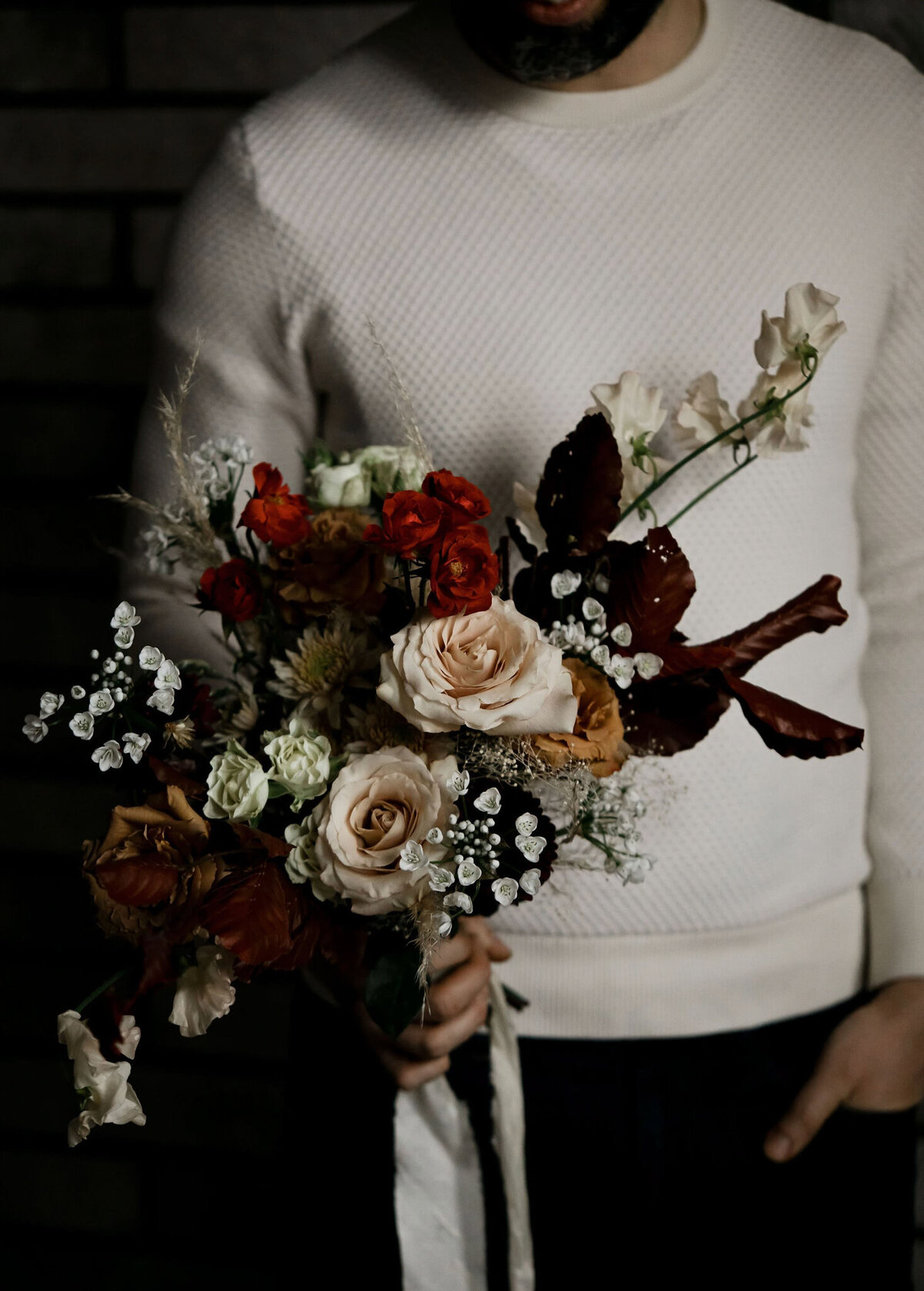 Moody and romantic bouquet by Hue Florals, artistic Calgary, Alberta wedding florist, featured on the Brontë Bride Vendor Guide.