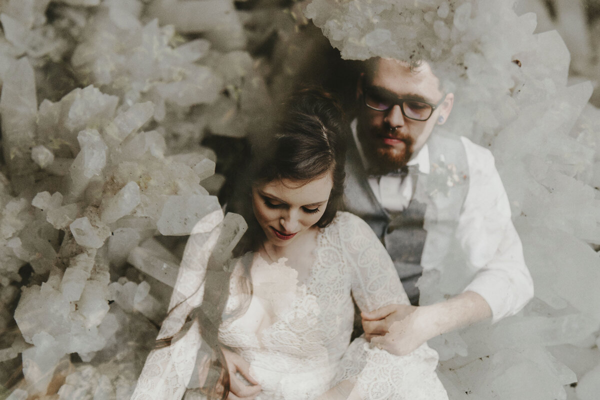 bride and groom snuggled up with a double exposure  of a crystal