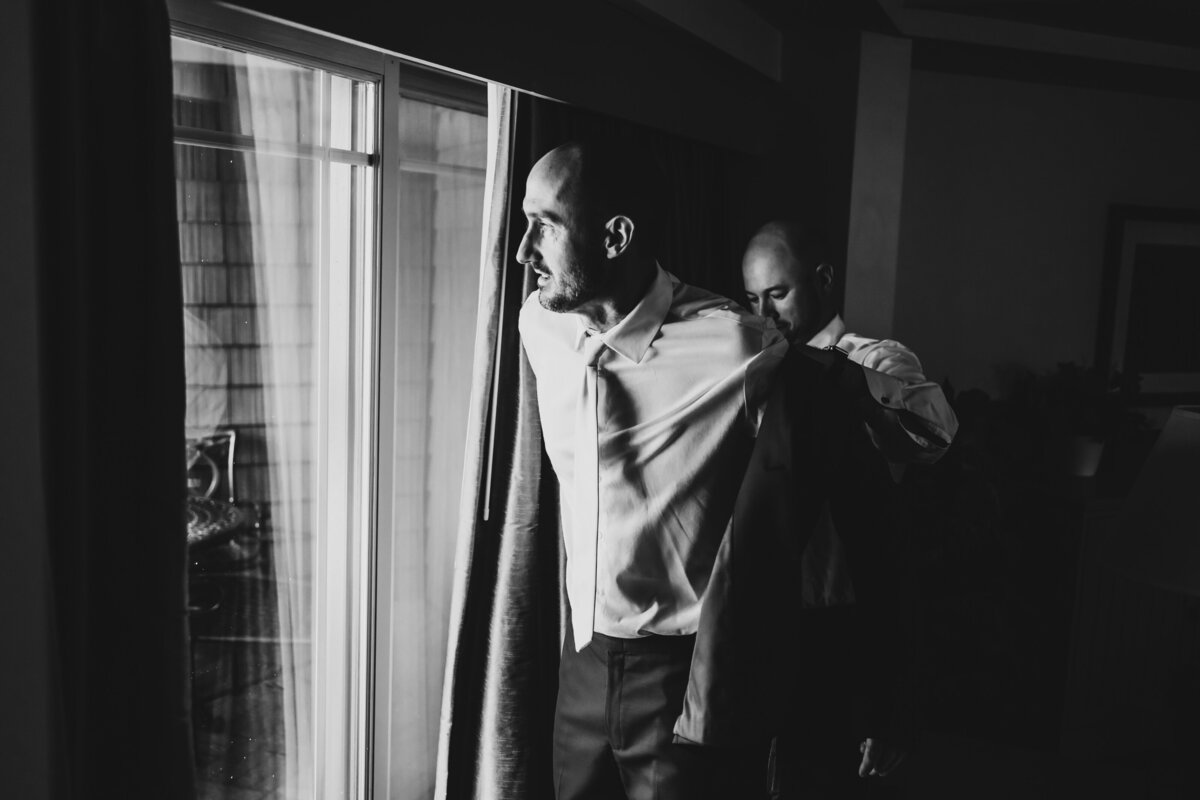 groom getting dressed