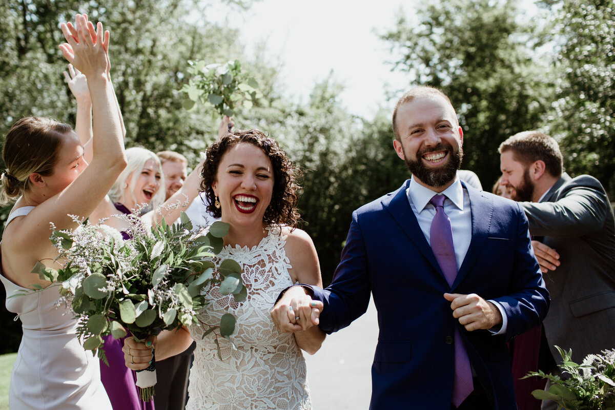 A happy just married couple captured by Fort Worth wedding photographer, Megan Christine Studio