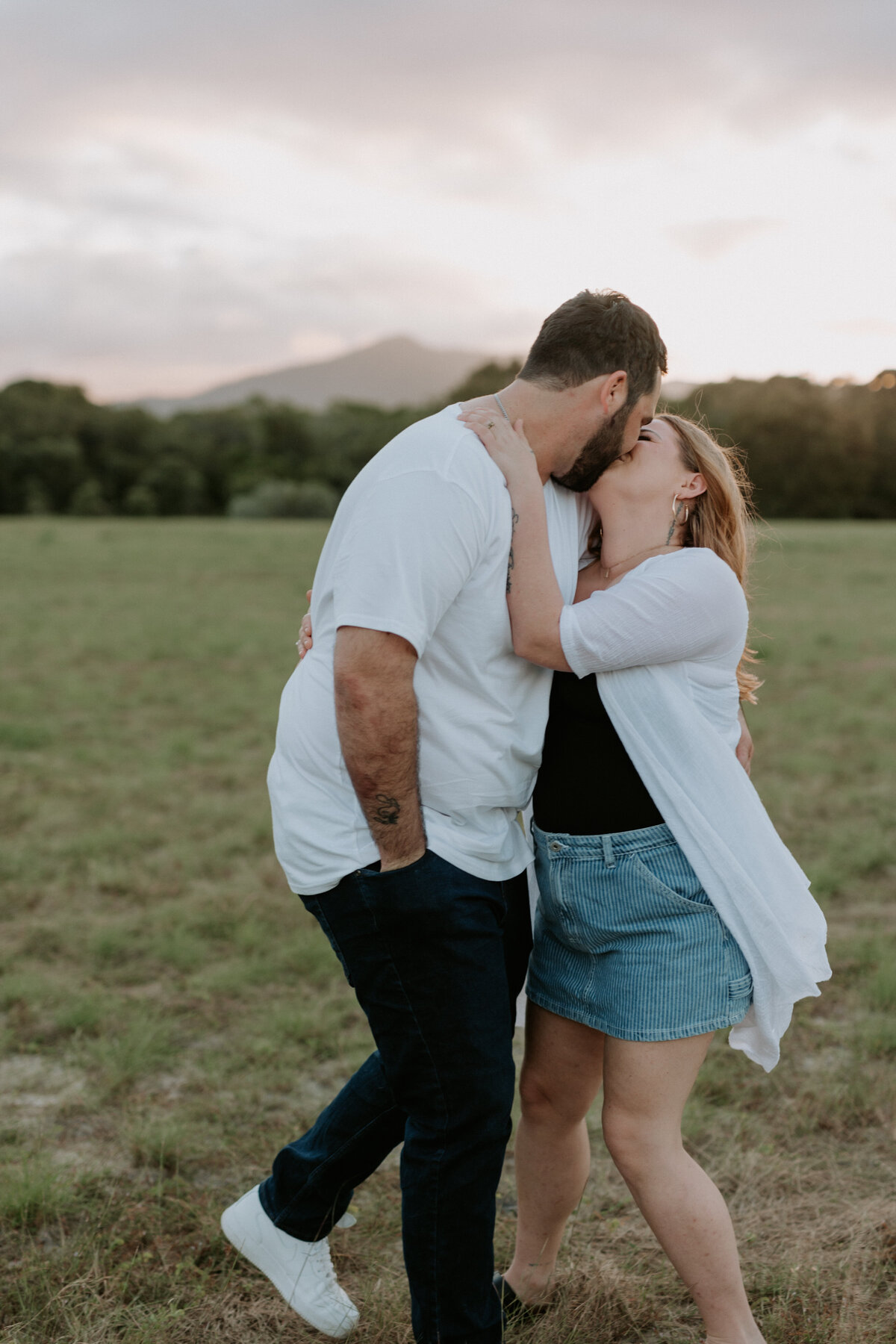 Mother and father kissing
