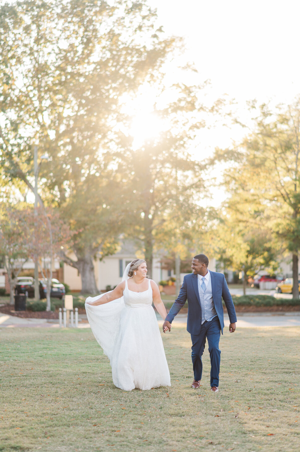Couple having a great time on their wedding day in downtown wilmington