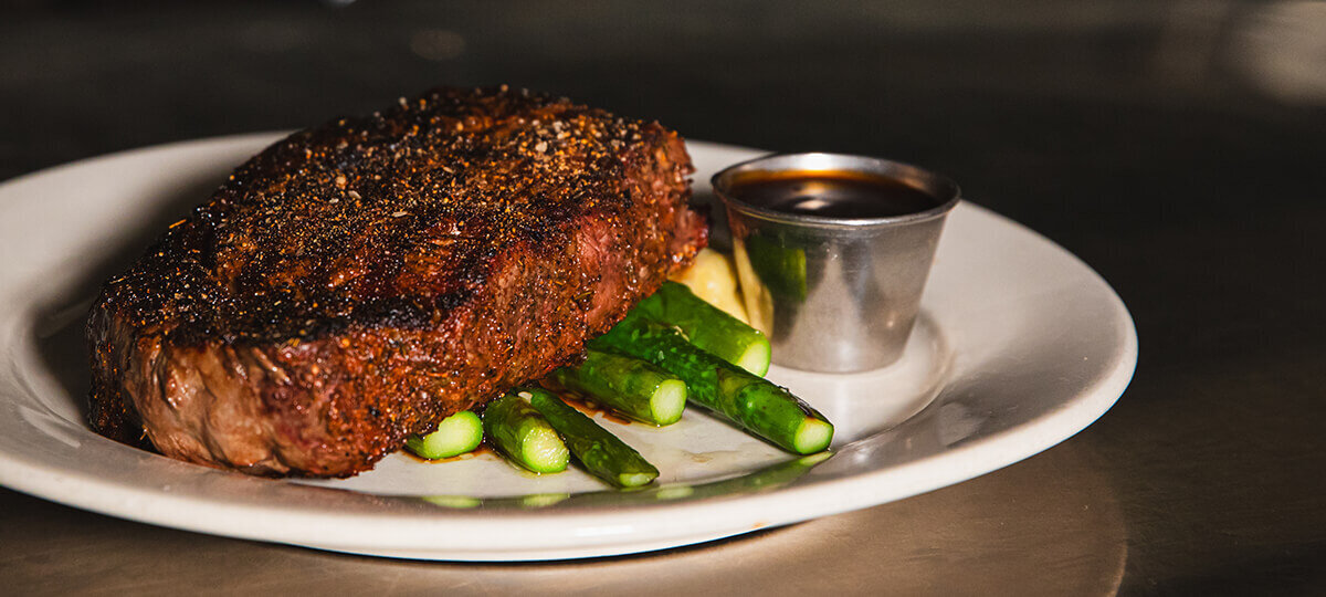 Rib Eye Steak representing the best steak and wine pairing in Mount Vernon