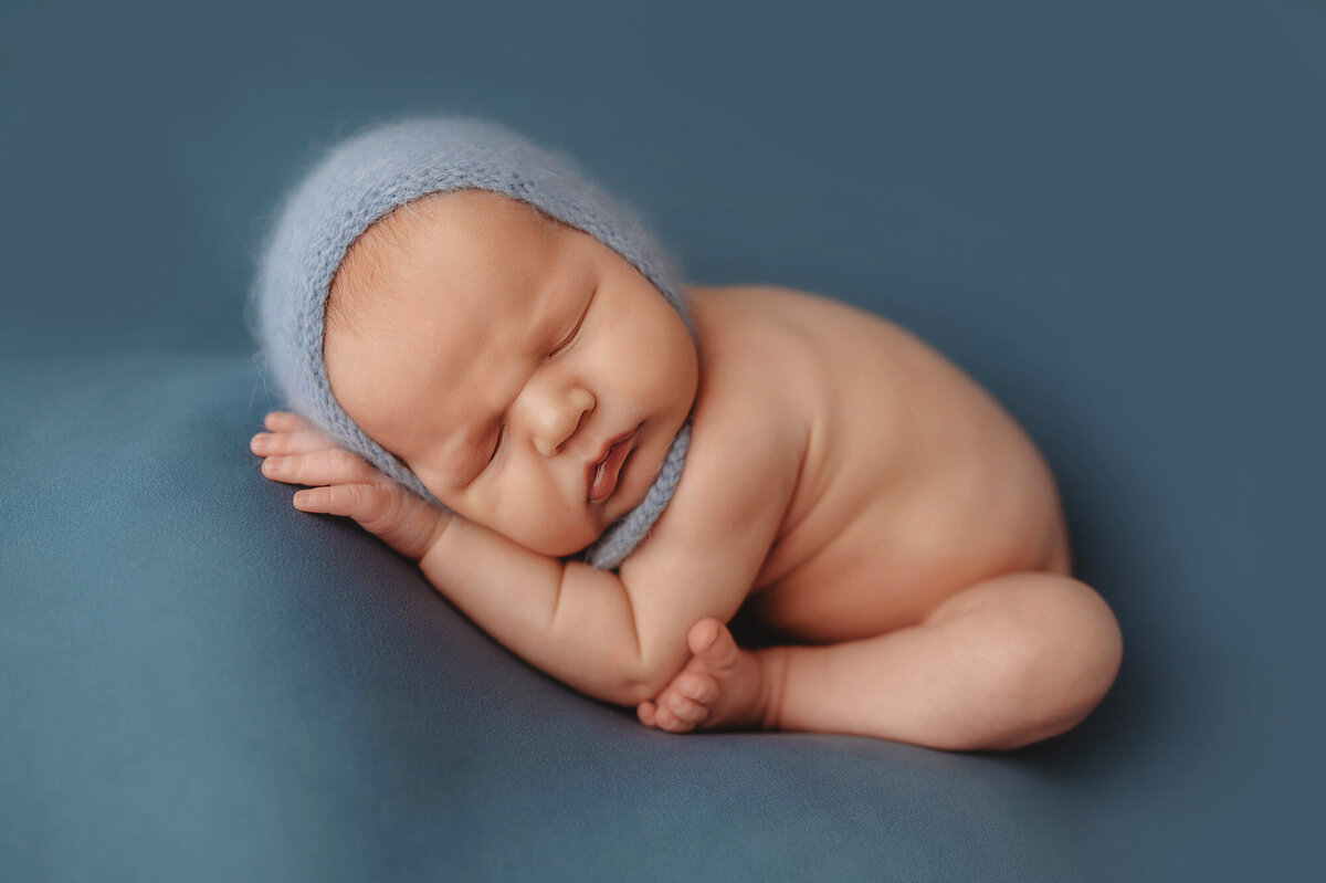 Infant posed for Newborn Portraits in Charleston.