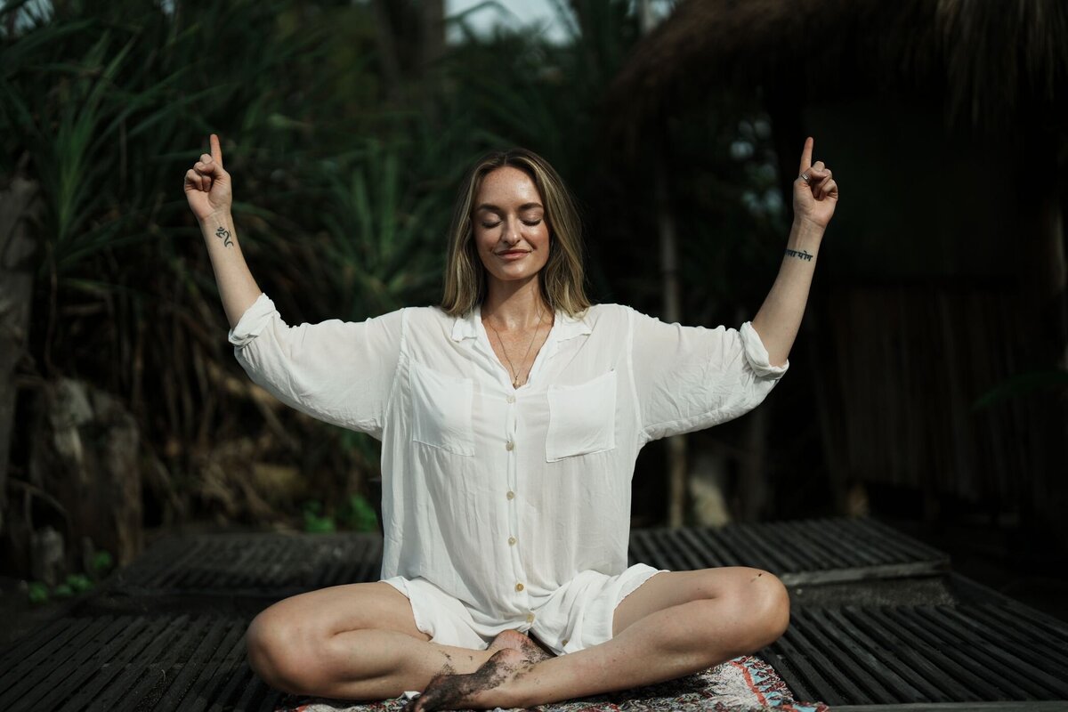 Noelle Rivet doing Kundalini yoga