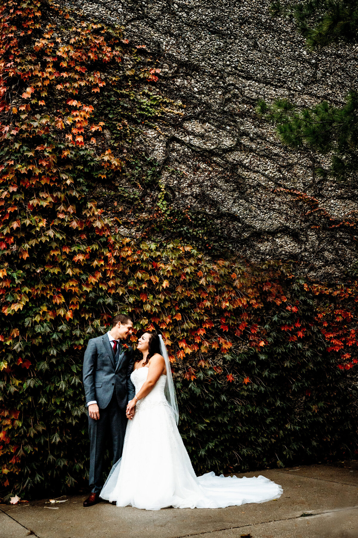 Bride and Groom in front of vines at The Grand Geneva