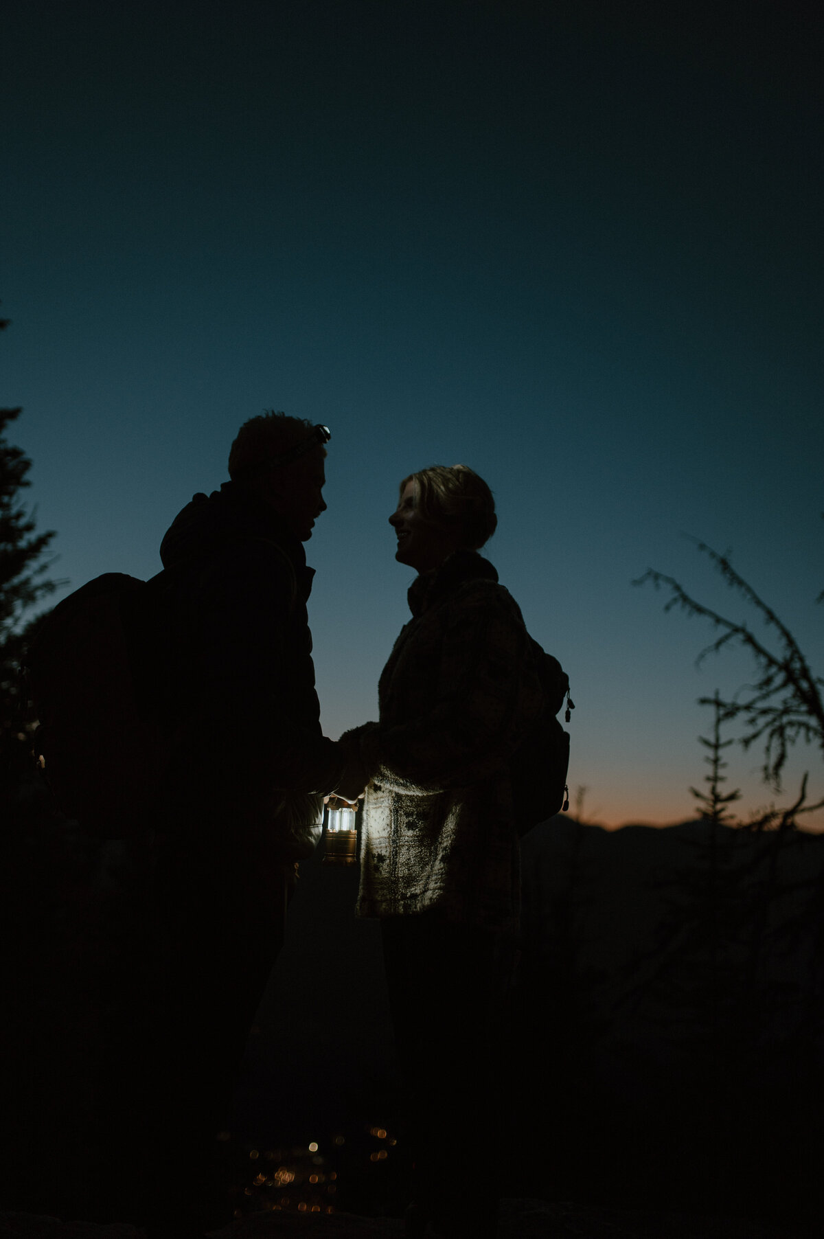 sunrise elopement hiking couple in Lake Louise, AB