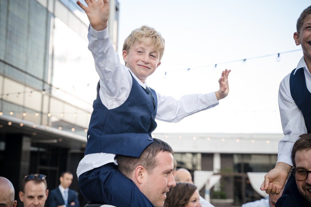 ring-bearer-on-groom-shoulders-dancing-at-jps-events.jpg