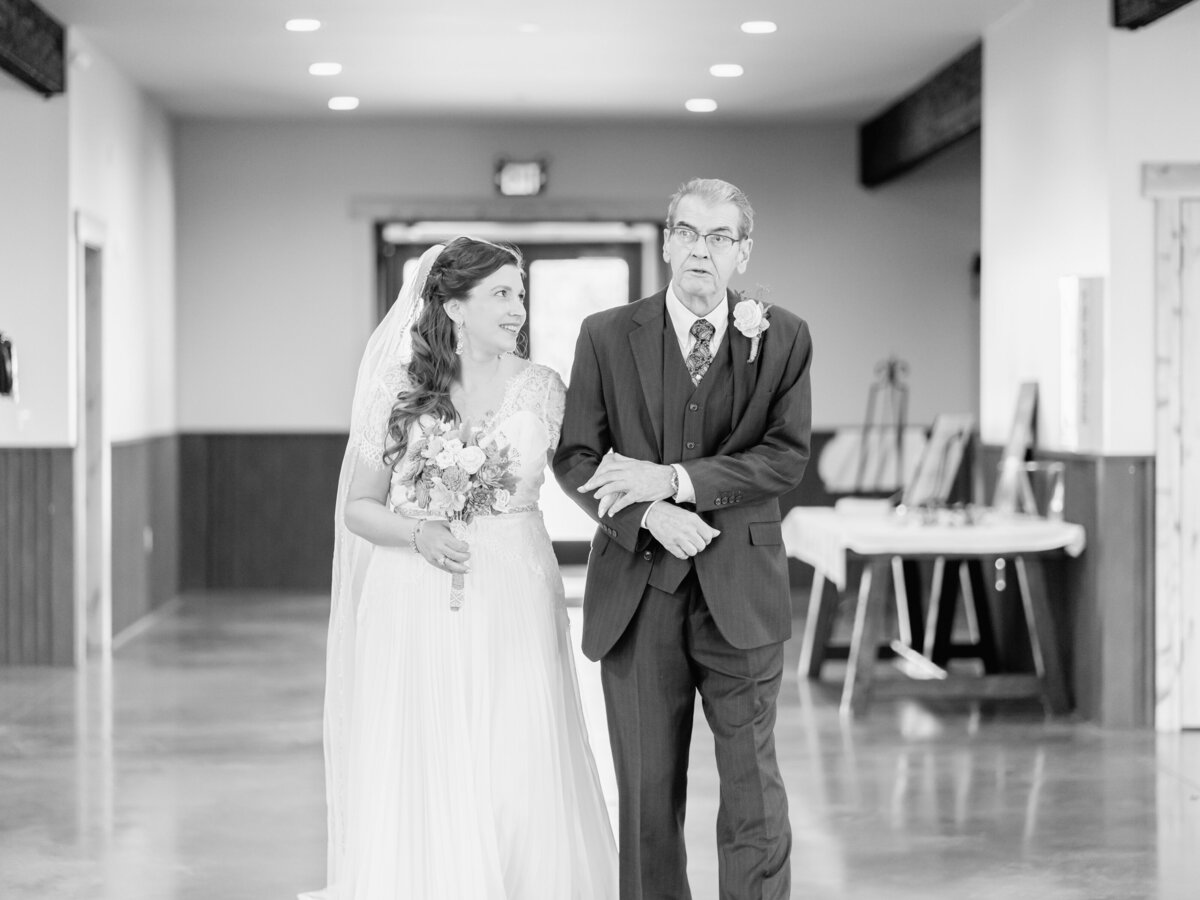 Bride and her dad walk down the aisle. Emotional moment captured by 4Karma Studio -San FRancisco wedding photographer