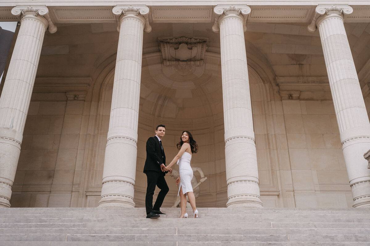 Elegant engagement portraits in Palais Royal garden in Paris