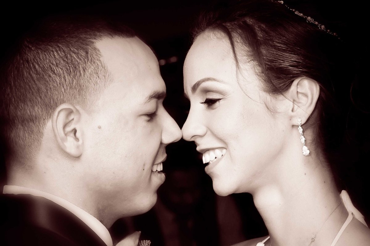 Bride and groom smile at each other in B+W. Photo by Ross Photography, Trinidad, W.I..
