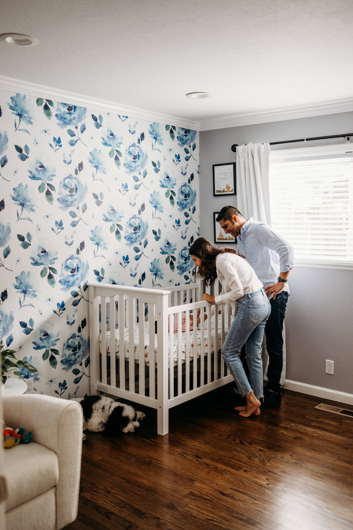 Mom and Dad in baby's nursery
