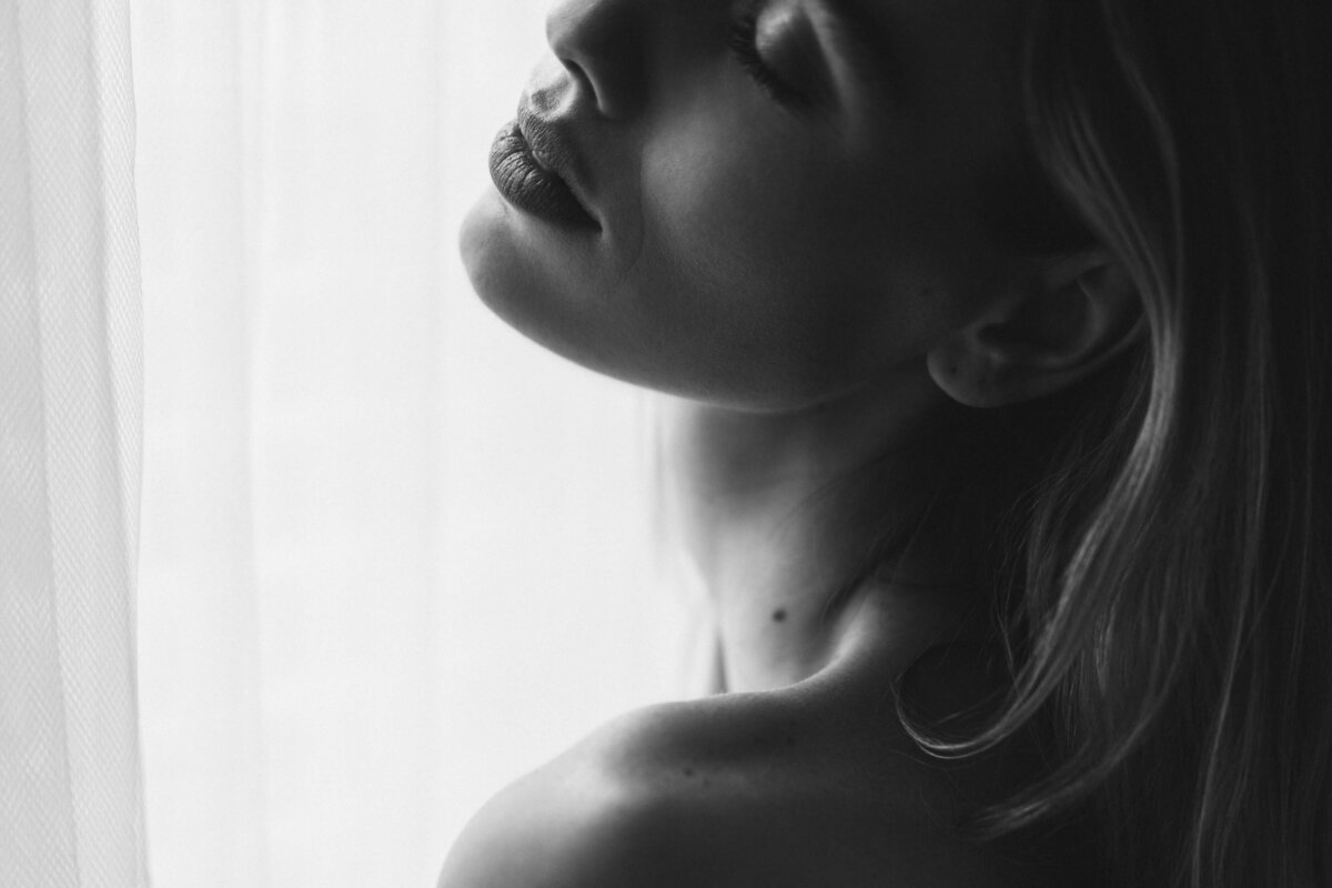 elegant close up of nude woman's neck