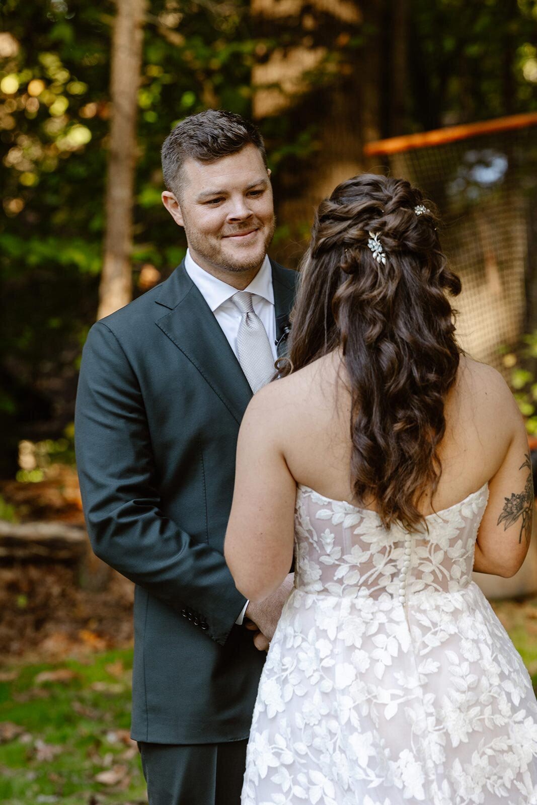 A groom reading his vows to his bride on their wedding day