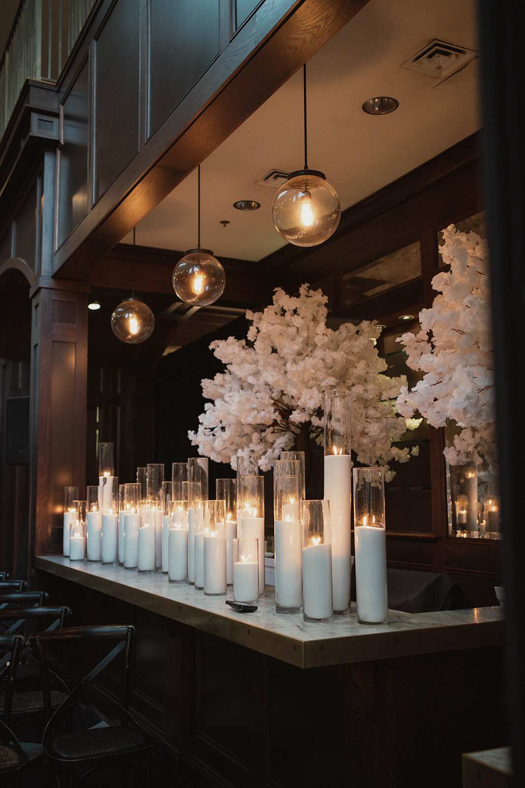 lit candles and white flowers 