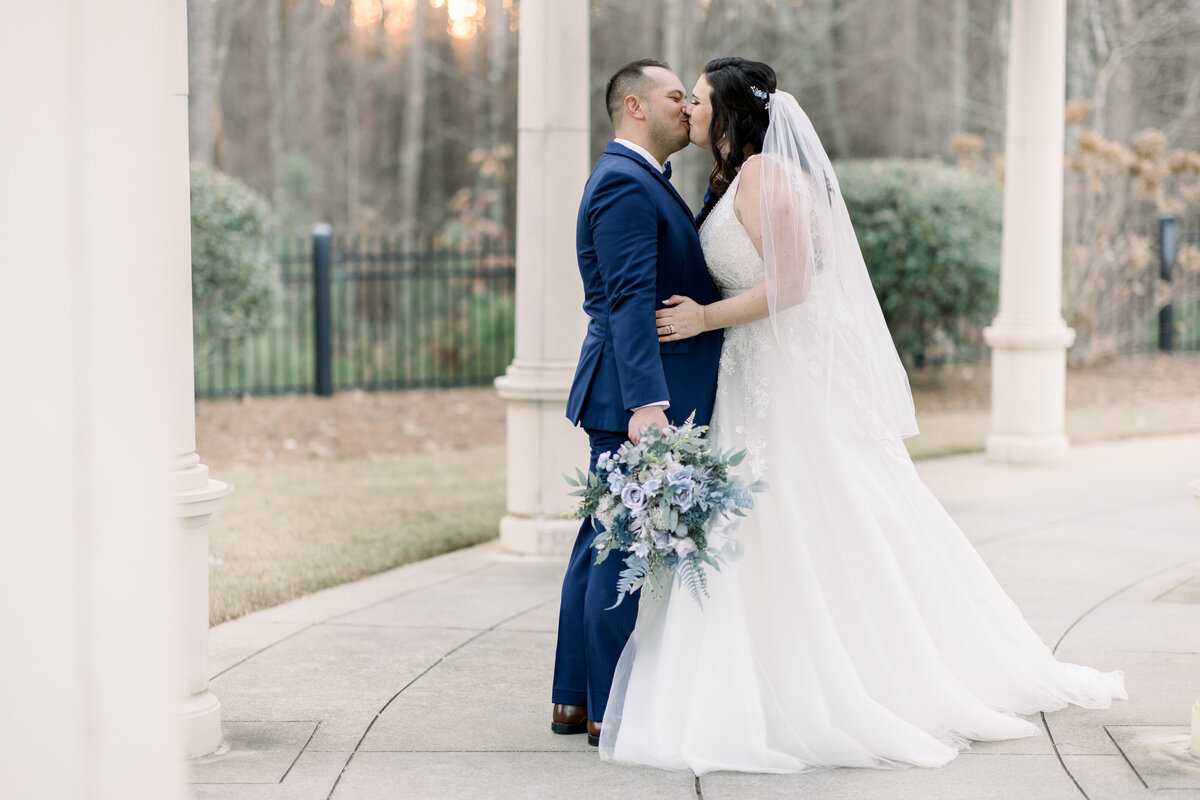 Ashton Gardens bride & groom kiss