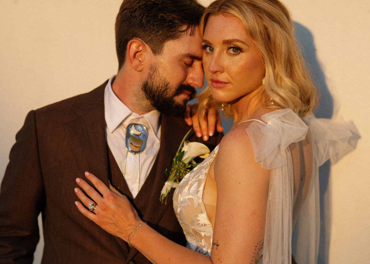 Bride and groom under veil image in vineyard in Santa Ynez, California