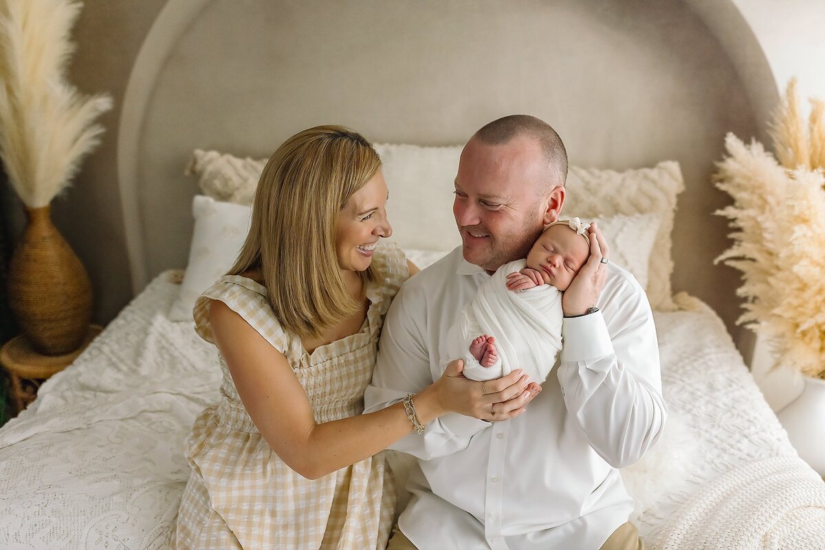 Harrisonburg newborn photographer mom and dad with baby