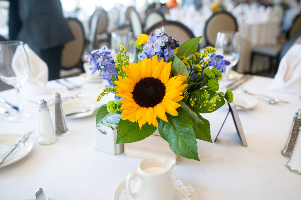 sunflower centerpiece on table at fairlawn country club