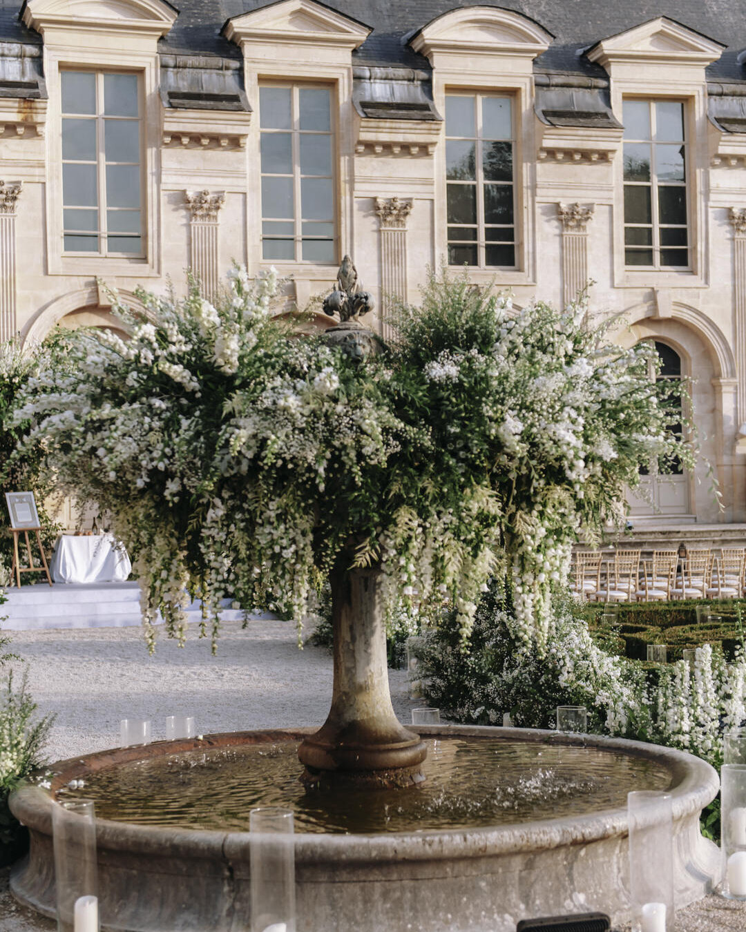 Paris Destination Wedding at Chateau de Chantilly by Alejandra Poupel Events Flower on the table 