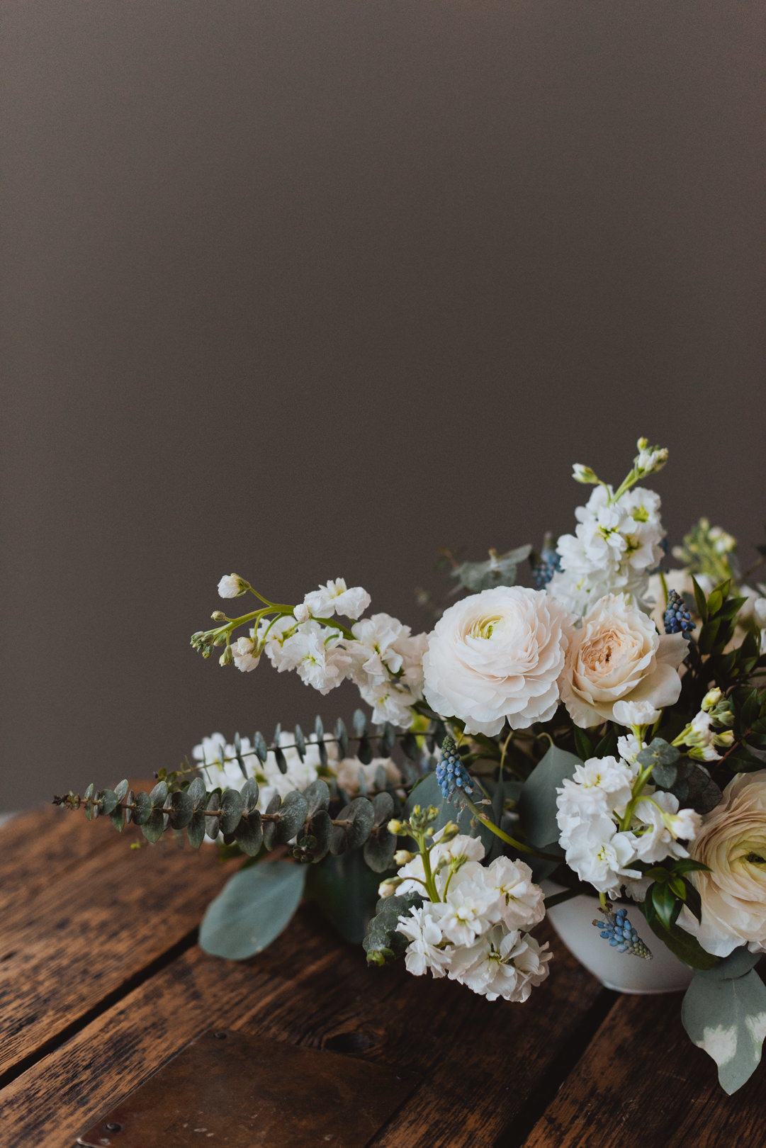 wedding flowers on wooden table