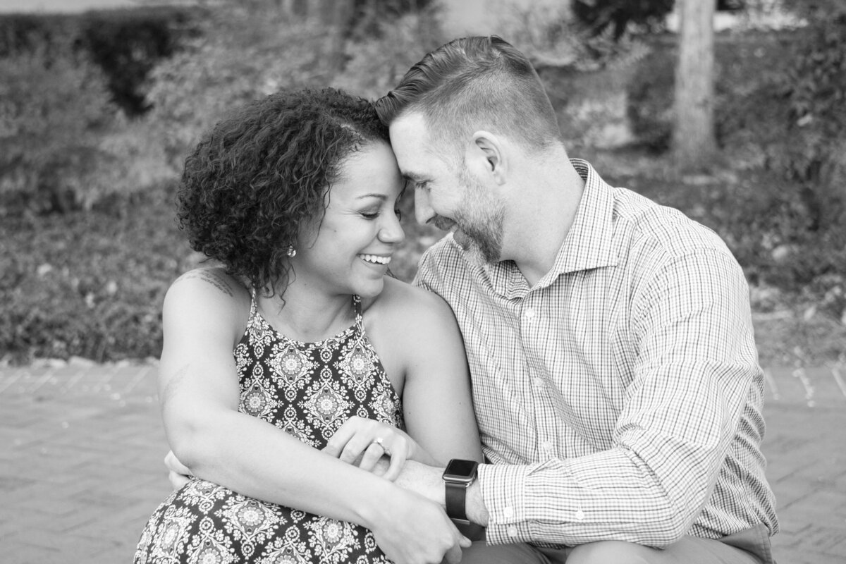 Clemson University couple touching foreheads engagement photography