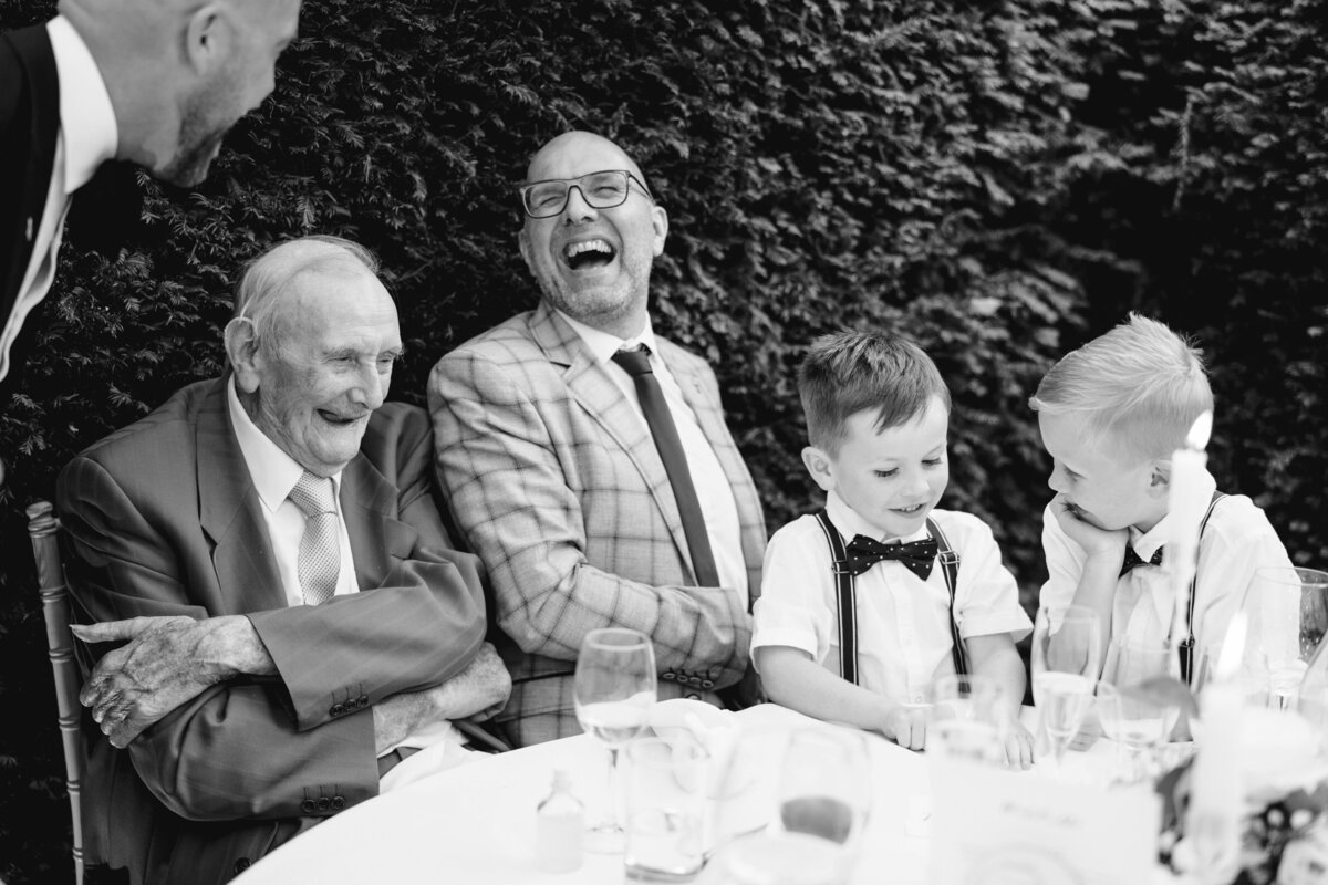 reportage laughing at a wedding family generations