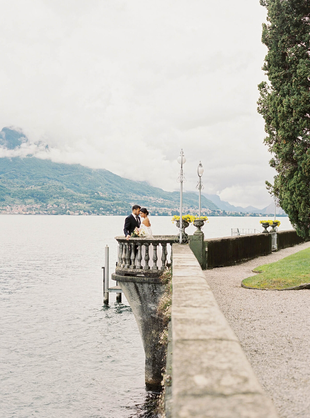 A wedding day photo of the bride and groom at Villa Aura del Lago on Lake Como in Italy