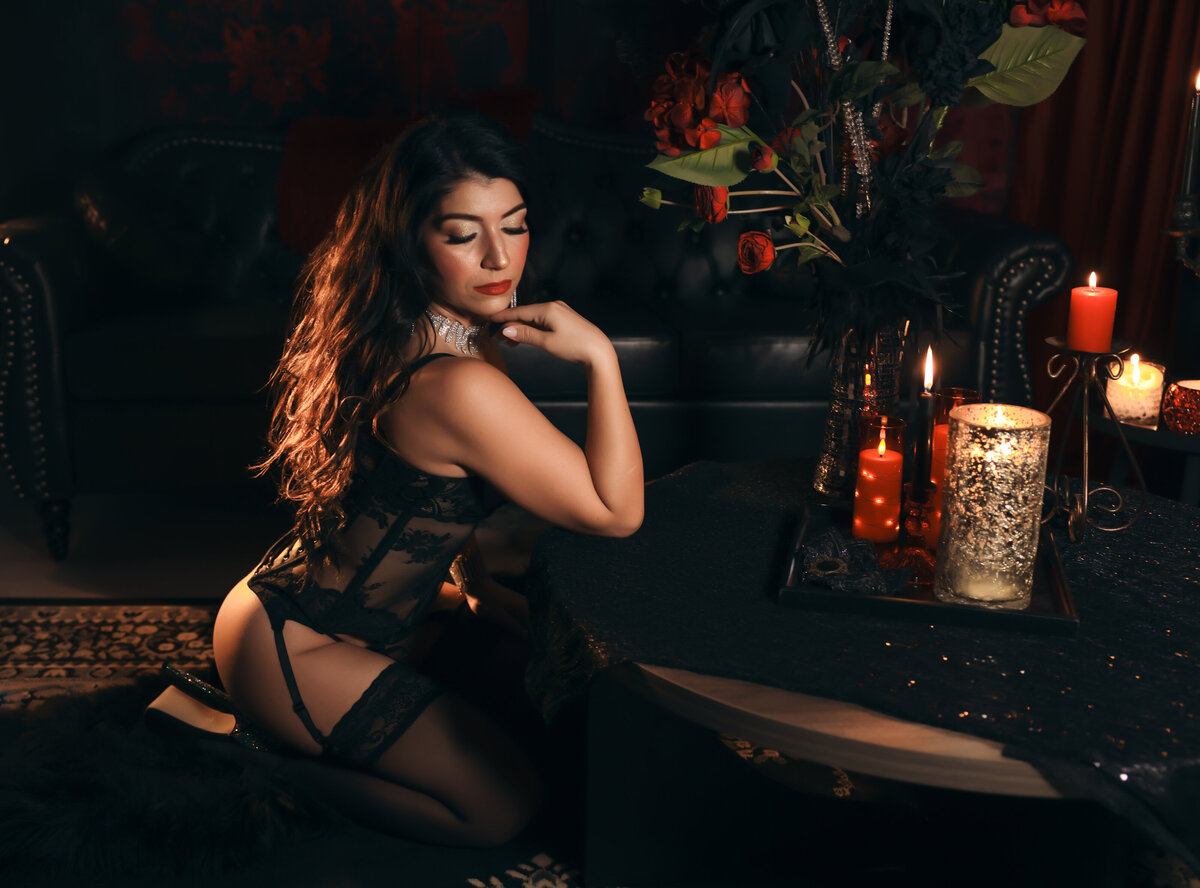 Savannah Boudoir  Brunette in red room with candles