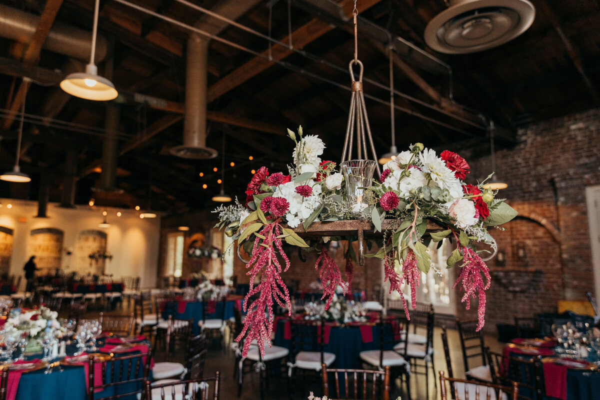 Loving all of the rich colors of this reception decor. Rich reds, greens and navy blues make for such a beautiful fall wedding.