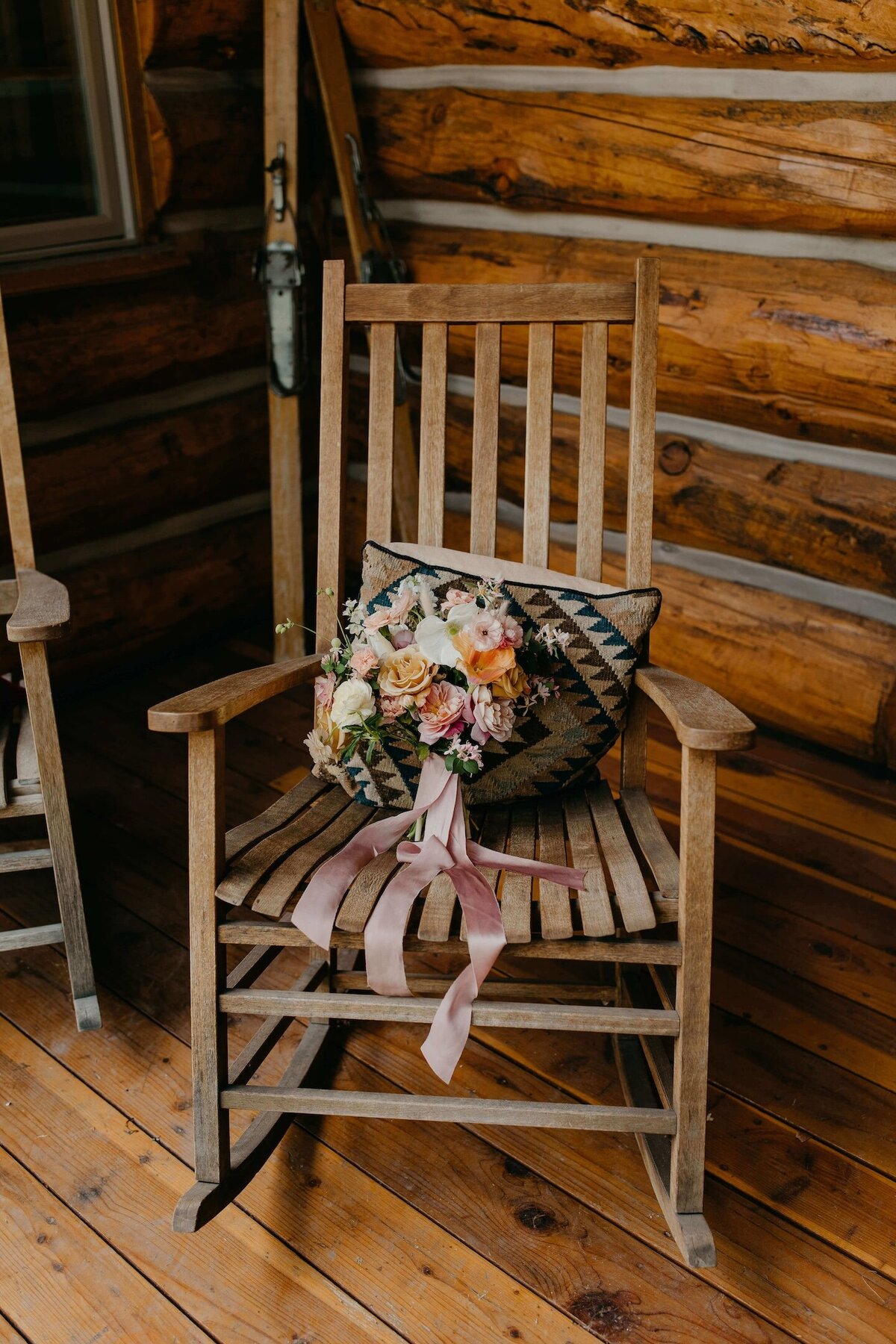 Bridal-bouquet-on-rockingchair-pink-silk-streamers