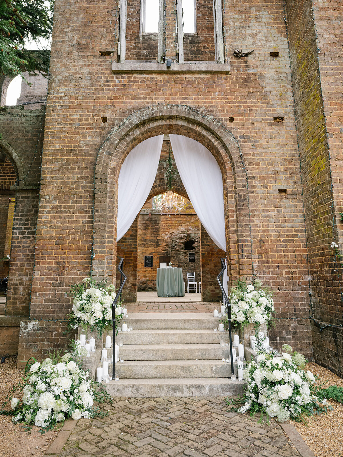 outdoor ruins flowers on arch