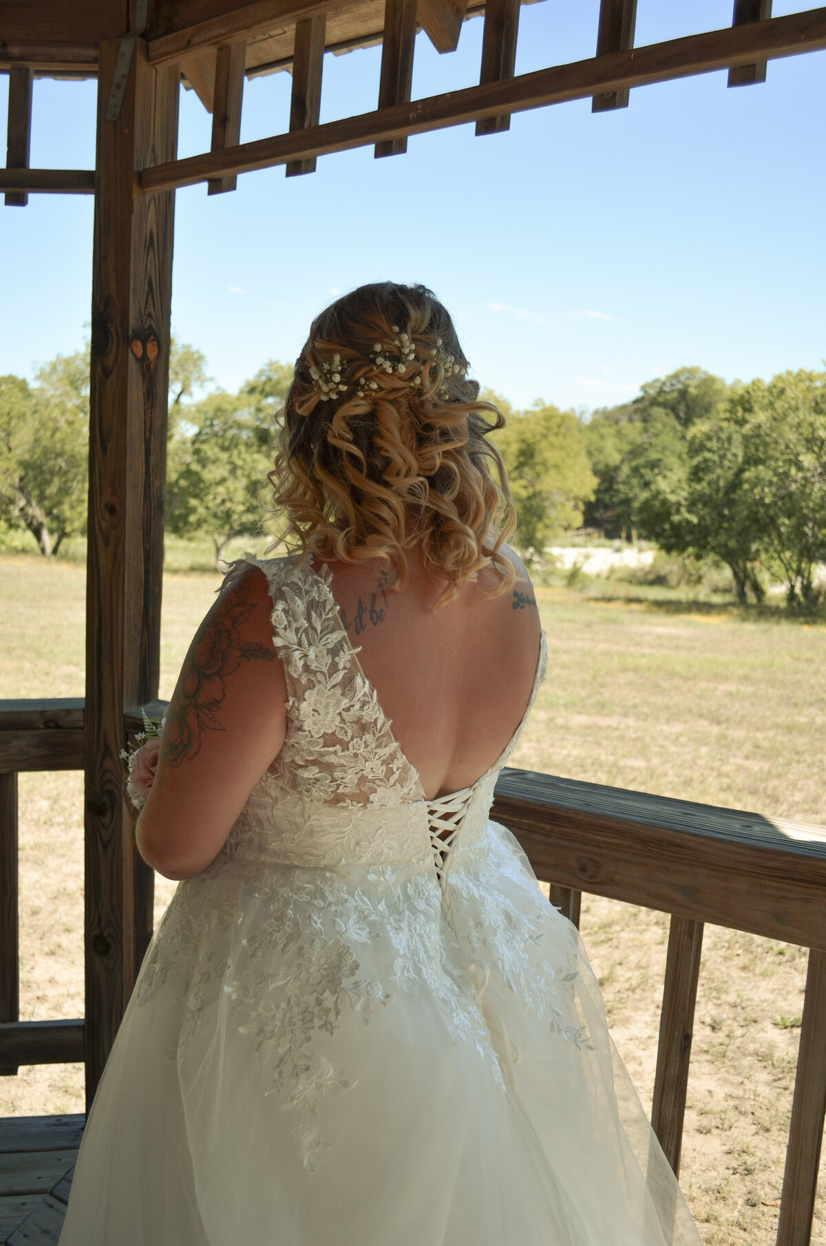 bridal portrait showing back of dress