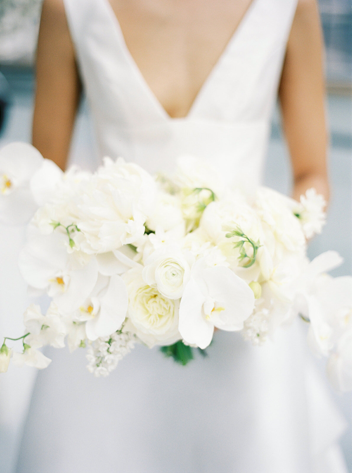 Romantic wedding bouquet with white spring flowers