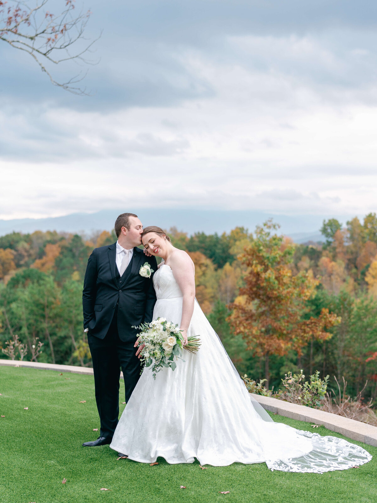 Bride and groom pictures overlooking the mountains at Nichols Heir