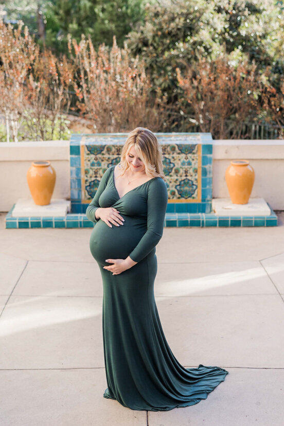 pregnant woman by balboa park tile mosaic