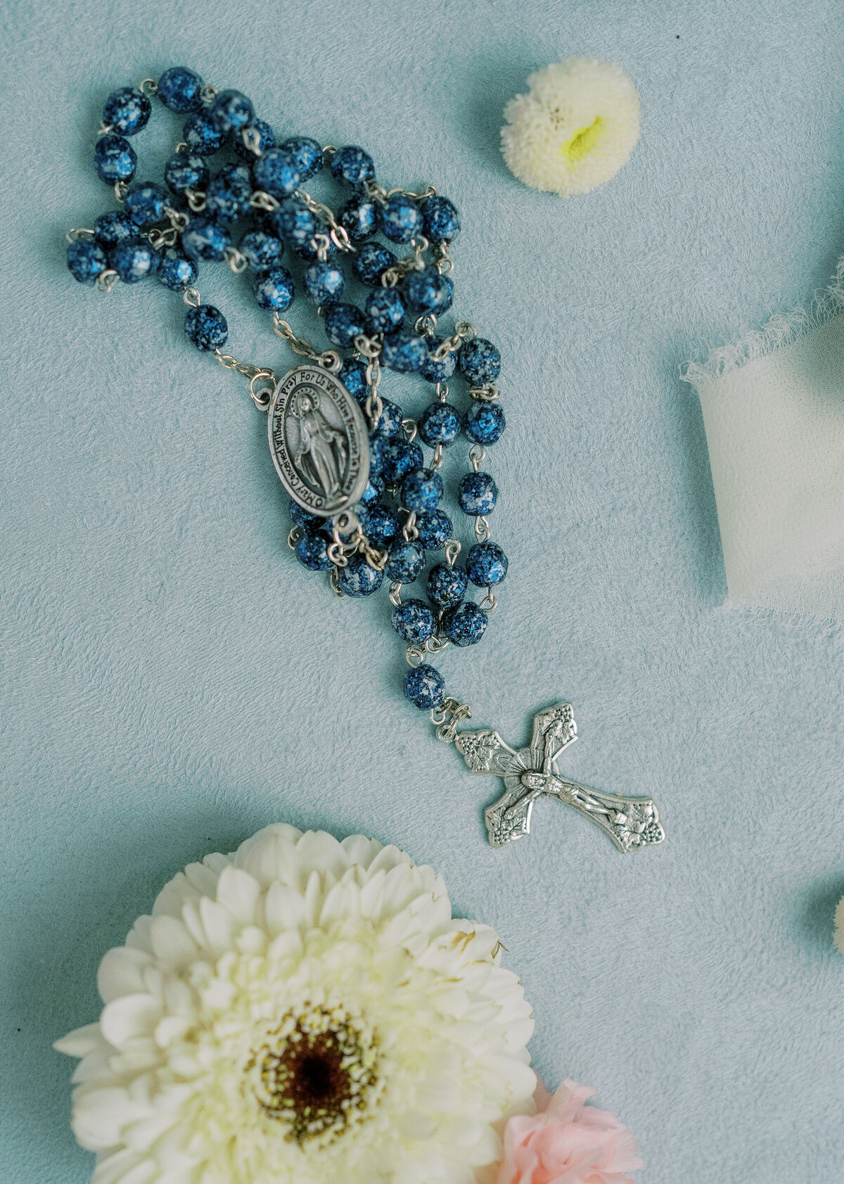 blue rosary beads for a wedding