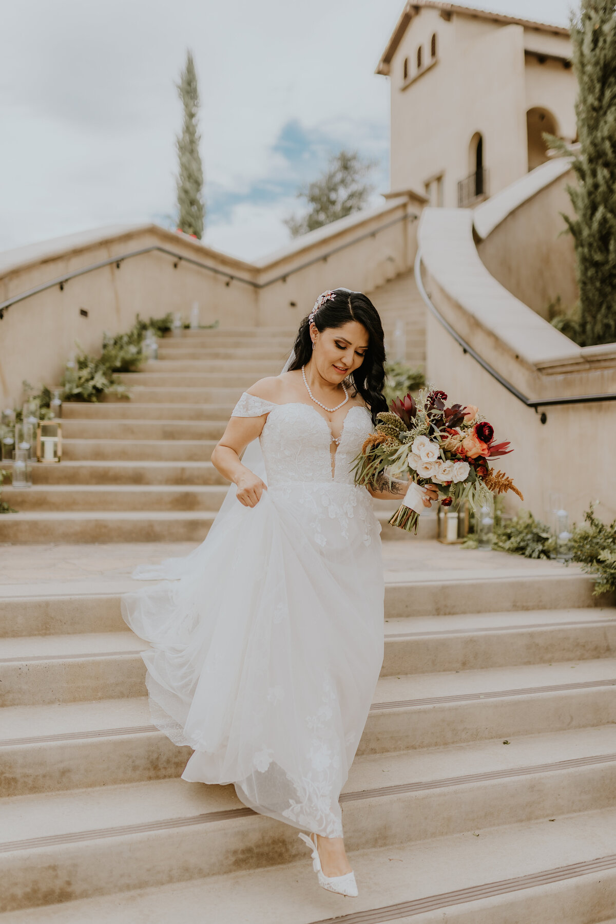 Bride walking down stairs on her wedding day Temecula, California Wedding and lifestyle photographer Yescphotography