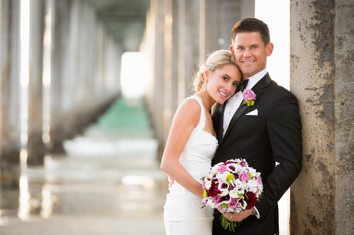 Scripps Pier wedding photos bride and groom pacific ocean