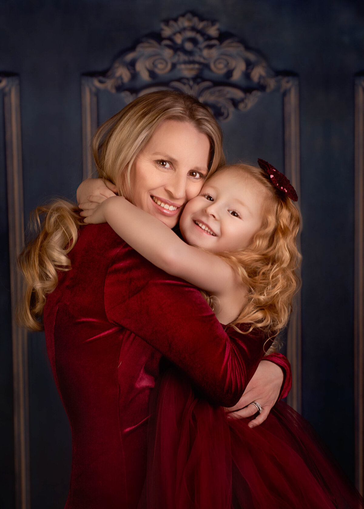 Intimate portrait of two siblings hugging and smiling, captured in Overland Park, Kansas. A joyful and candid choice for families seeking sibling-focused photography