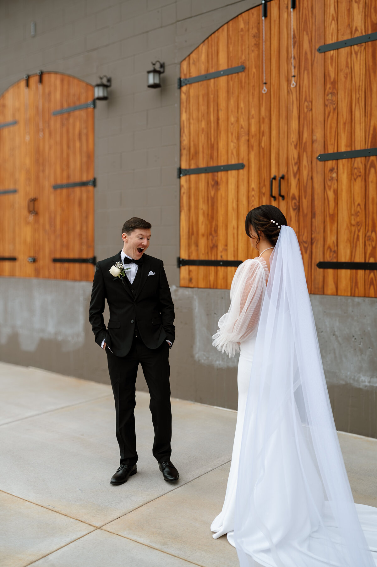 Bride-Groom-First-Look-at-Harvester-Square-St-Cloud-MN