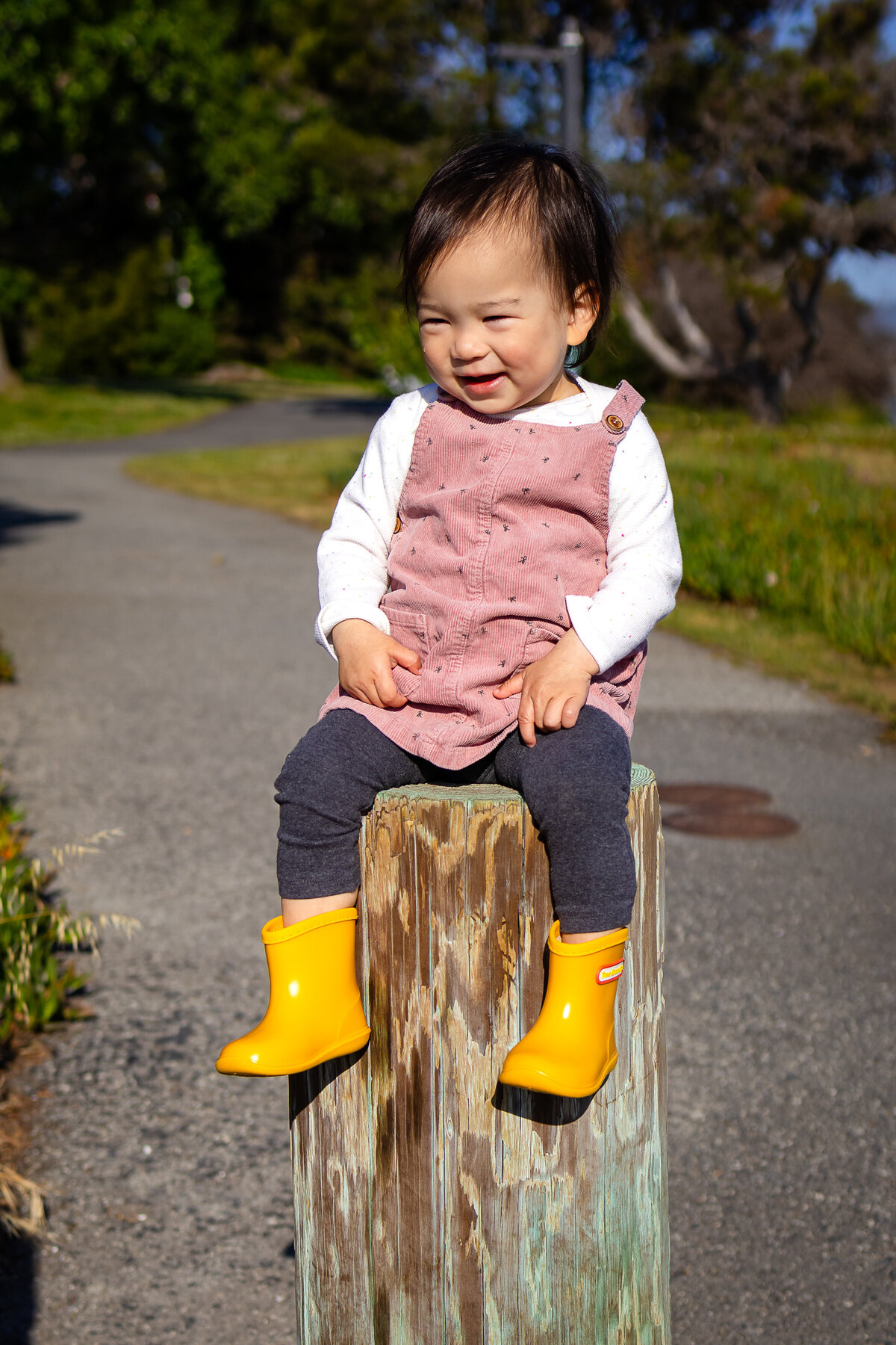 Candid moment of girl toddler bonding by the San Francisco Bay – natural light family photography by Ellobelle Photography, San Francisco Peninsula Bay Trail Burlingame