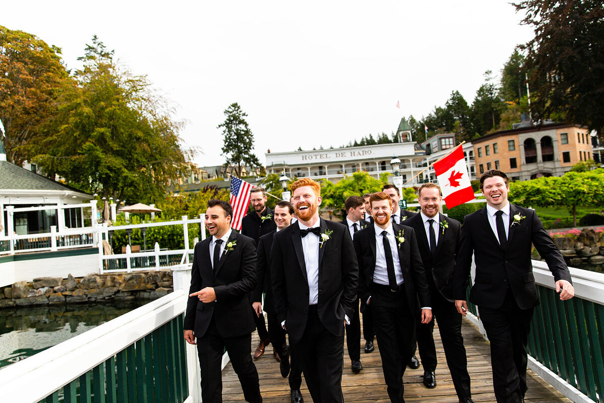 Groom and Groomsmen on docks at Roche Harbor Resort