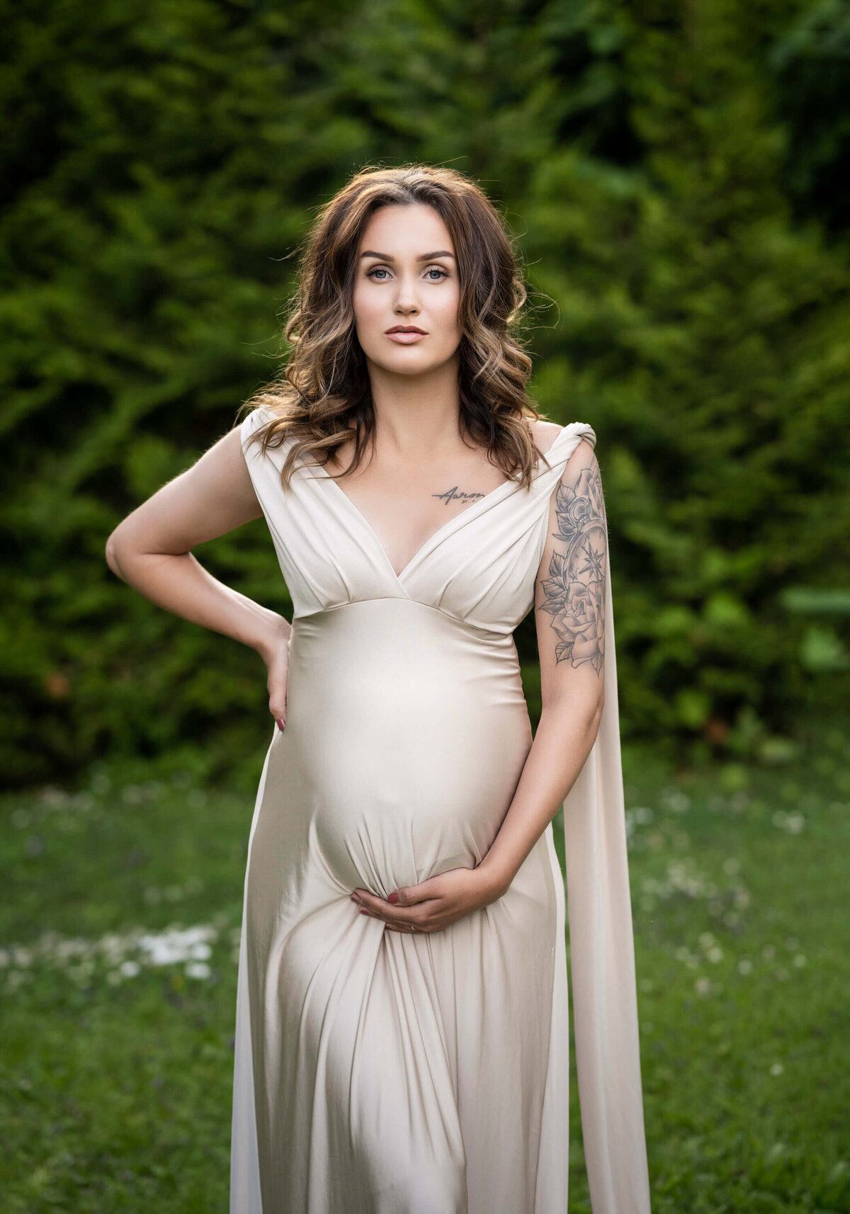 Confident expectant mother in nature.