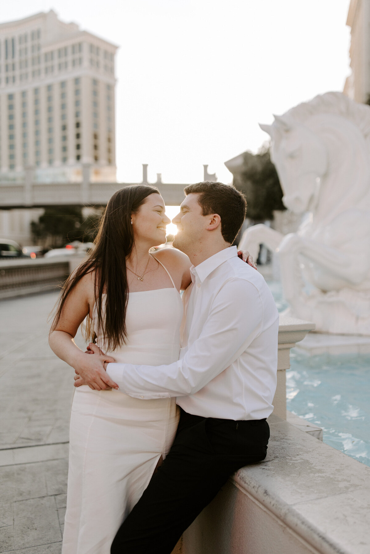 A couple looks closely into each other's eyes on the Strip in Las Vegas.