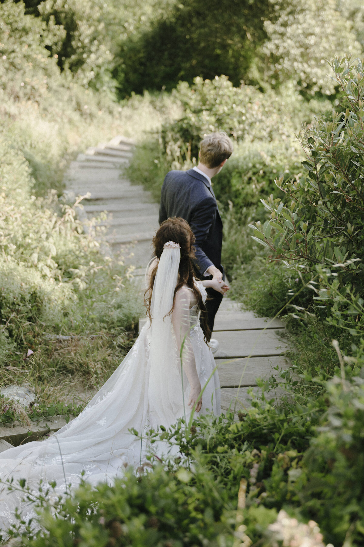 Bride and Groom at Marshall's Beach in San Francisco, California at sunset