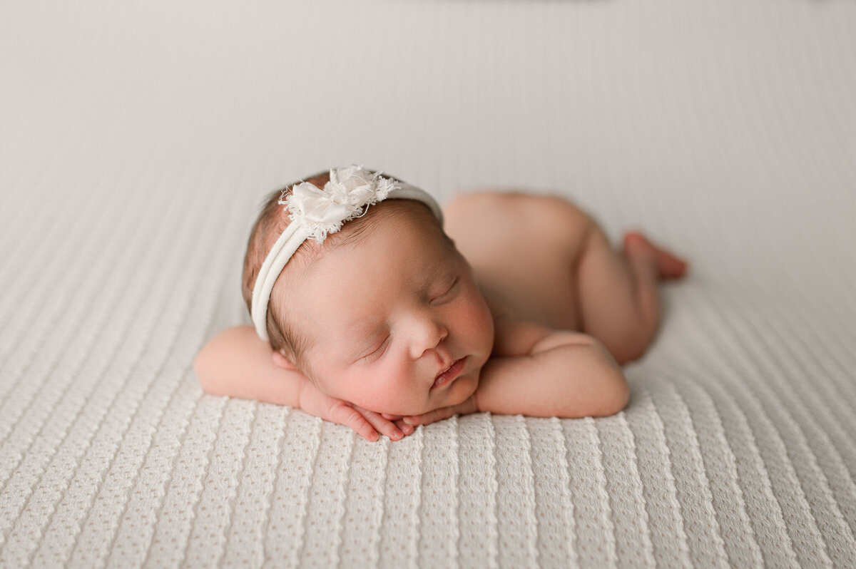 Newborn sleeping natural light studio