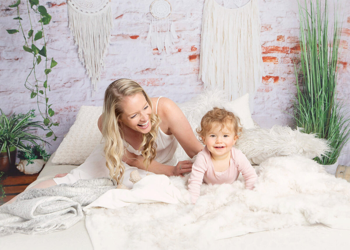 Mom and baby daughter laughing in a Mothers Day photoshoot by LA photographer Elsie Rose Photography