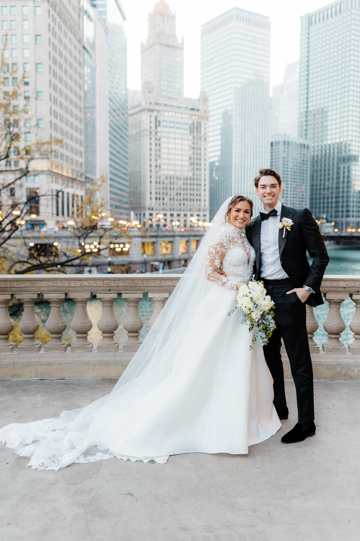Couple standing near a bridge during their South Bend wedding photo session.